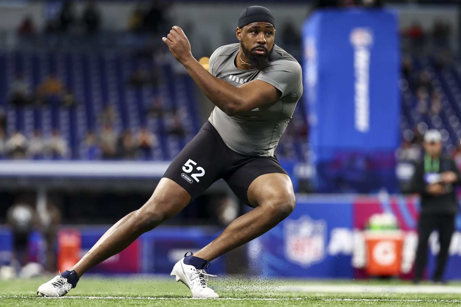 INDIANAPOLIS, INDIANA - FEBRUARY 29: Eric Watts #DL52 of Connecticut participates in a drill during the NFL Combine at Lucas Oil Stadium on February 29, 2024 in Indianapolis, Indiana. (Photo by Kevin Sabitus/Getty Images)