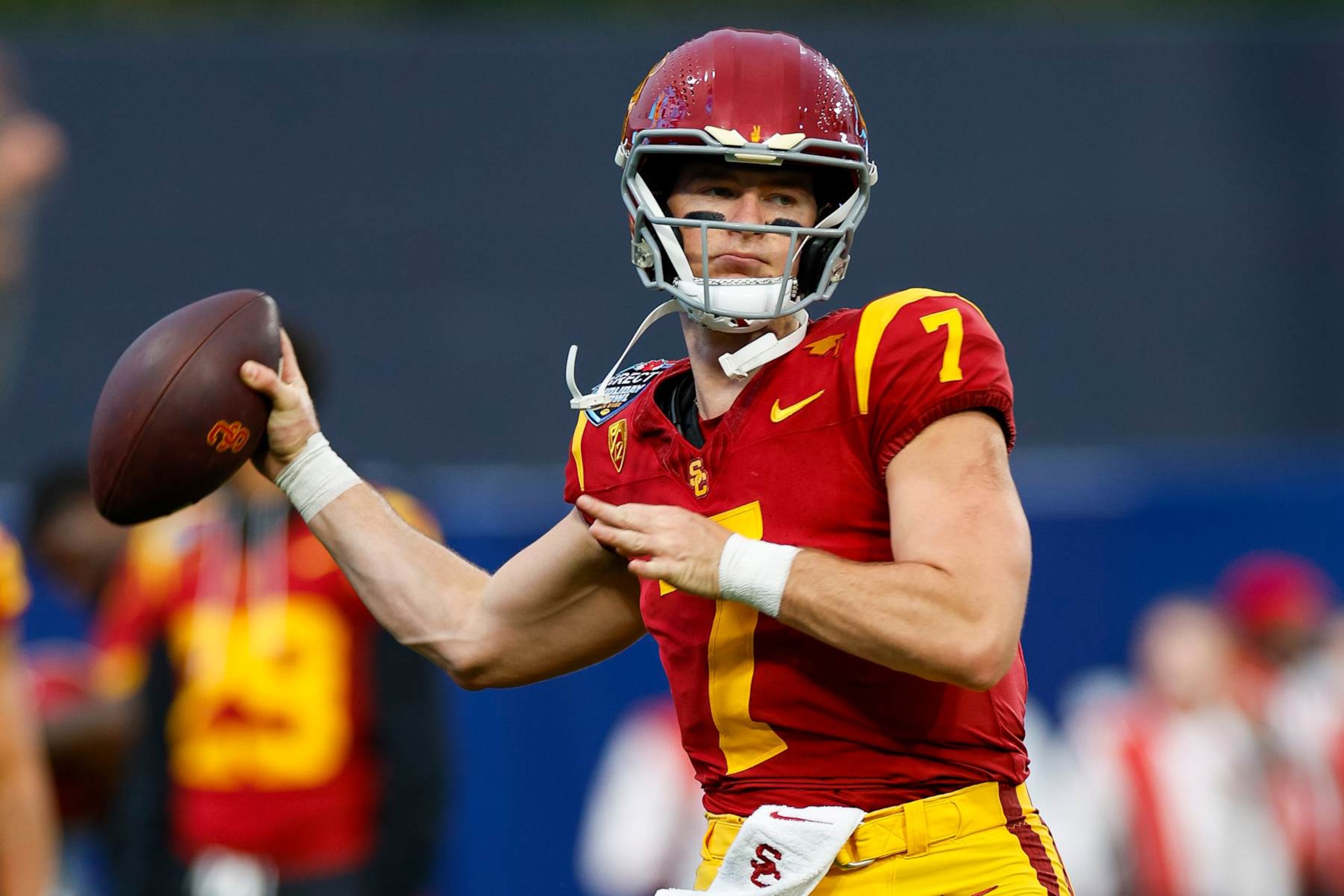 SAN DIEGO, CALIFORNIA - DECEMBER 27: Miller Moss #7 of the USC Trojans warms up prior to the DIRECTV Holiday Bowl game against the Louisville Cardinals at Petco Park on December 27, 2023 in San Diego, California. (Photo by Brandon Sloter/Getty Images) SAN DIEGO, CALIFORNIA - DECEMBER 27: Miller Moss #7 of the USC Trojans warms up prior to the DIRECTV Holiday Bowl game against the Louisville Cardinals at Petco Park on December 27, 2023 in San Diego, California. (Photo by Brandon Sloter/Getty Images)