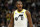 SALT LAKE CITY, UTAH - APRIL 02: Kris Dunn #11 of the Utah Jazz reacts to a call during the first half of a game against the Cleveland Cavaliers at Delta Center on April 02, 2024 in Salt Lake City, Utah. NOTE TO USER: User expressly acknowledges and agrees that, by downloading and or using this photograph, User is consenting to the terms and conditions of the Getty Images License Agreement. (Photo by Alex Goodlett/Getty Images)
