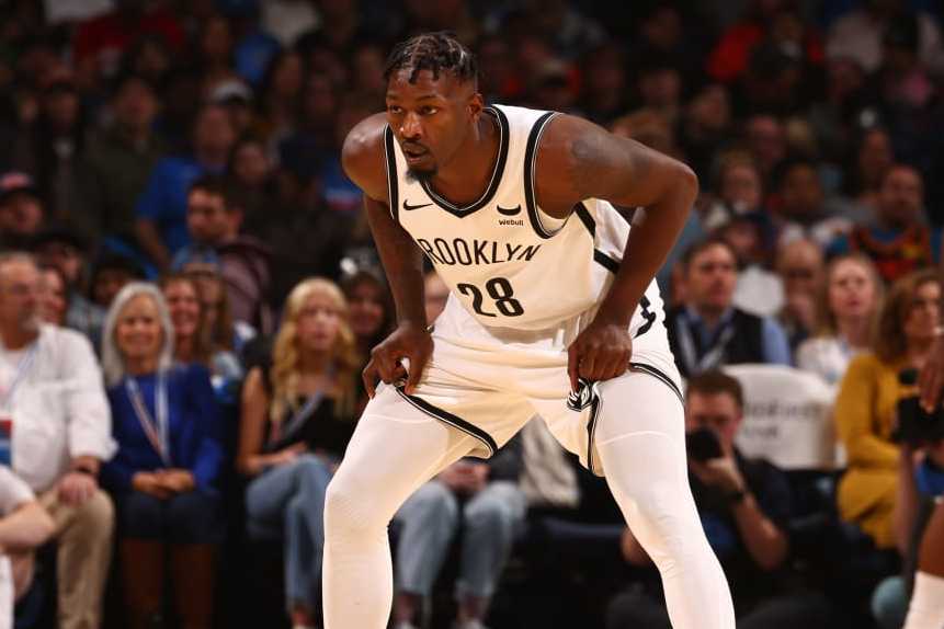 OKLAHOMA CITY, OK - DECEMBER 31: Dorian Finney-Smith #28 of the Brooklyn Nets plays defense against Jalen Williams #8 of the Oklahoma City Thunder during the game on December 31, 2023 at Paycom Arena in Oklahoma City, Oklahoma. NOTE TO USER: User expressly acknowledges and agrees that, by downloading and or using this photograph, User is consenting to the terms and conditions of the Getty Images License Agreement. Mandatory Copyright Notice: Copyright 2023 NBAE (Photo by Zach Beeker/NBAE via Getty Images)