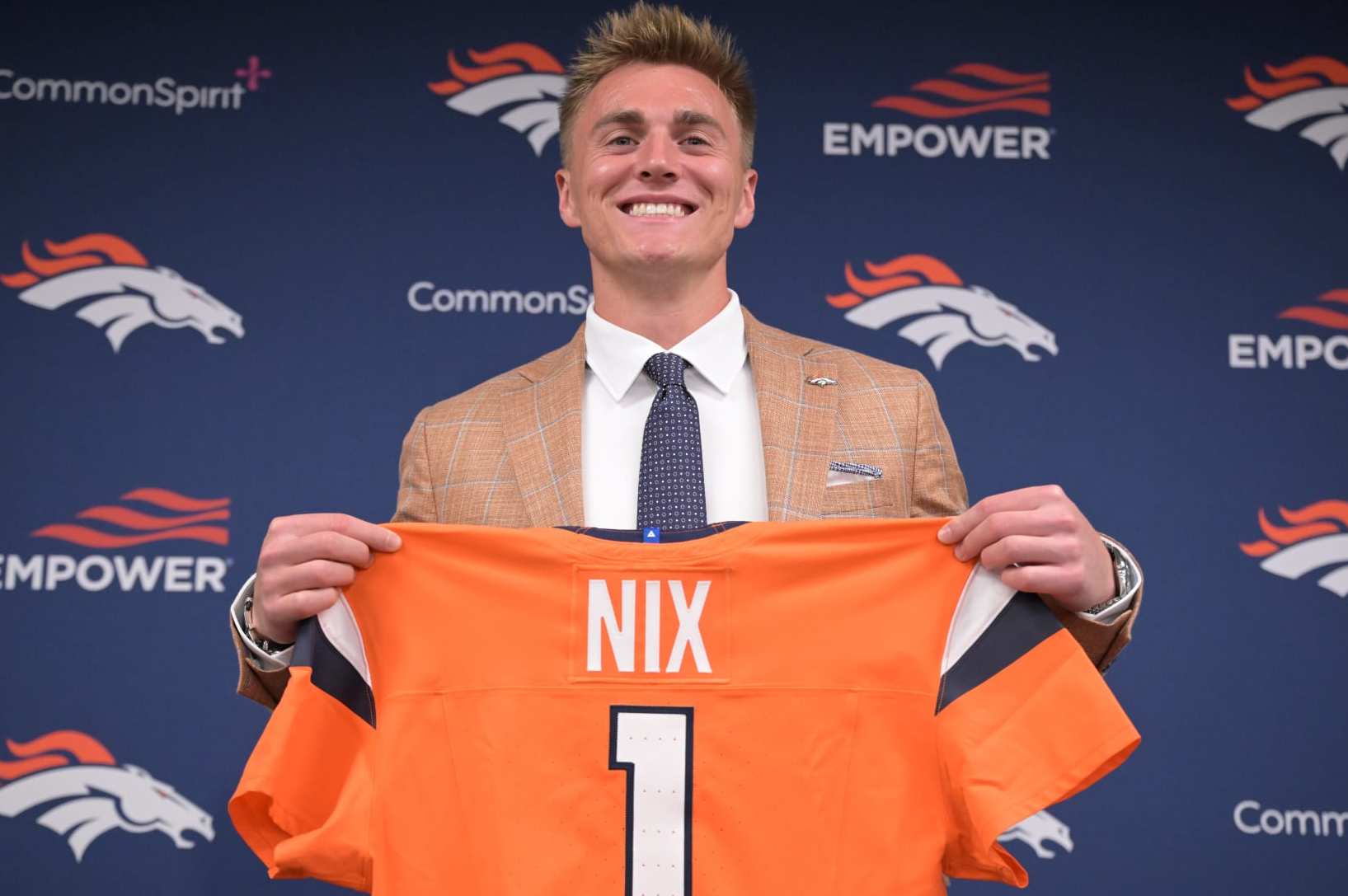ENGLEWOOD, CO - APRIL 26 : Denver Broncos quarterback Bo Nix introduced at Centura Health Training Center in Englewood, Colorado on Friday, April 26, 2024. (Photo by Hyoung Chang/The Denver Post)