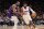 PHOENIX, ARIZONA - APRIL 09: Paul George #13 of the LA Clippers drives the ball against Kevin Durant #35 of the Phoenix Suns during the second half of the NBA game at Footprint Center on April 09, 2024 in Phoenix, Arizona.  NOTE TO USER: User expressly acknowledges and agrees that, by downloading and or using this photograph, User is consenting to the terms and conditions of the Getty Images License Agreement.  (Photo by Christian Petersen/Getty Images)