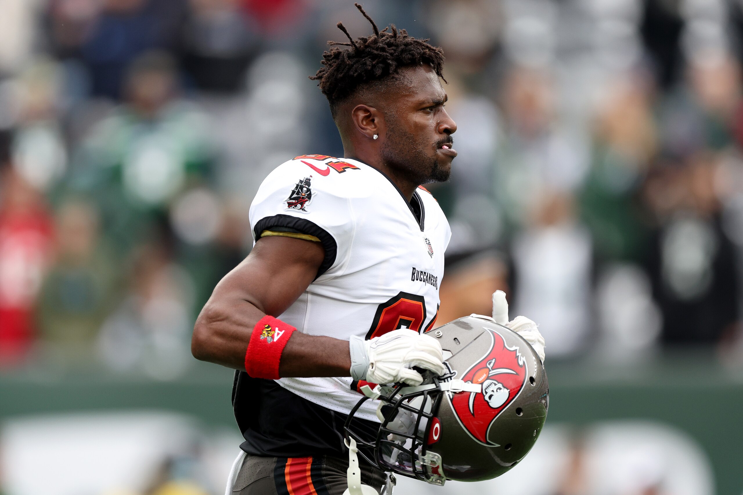 EAST RUTHERFORD, NEW JERSEY - JANUARY 02:  Antonio Brown #81 of the Tampa Bay Buccaneers looks on against the New York Jets during the game at MetLife Stadium on January 02, 2022 in East Rutherford, New Jersey. (Photo by Elsa/Getty Images)