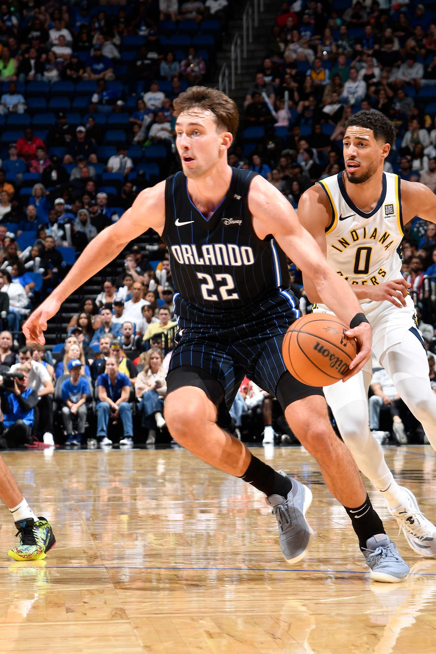 ORLANDO, FL - NOVEMBER 13: Franz Wagner #22 of the Orlando Magic dribbles the ball during the game against the Indiana Pacers on November 13, 2024 at Kia Center in Orlando, Florida. NOTE TO USER: User expressly acknowledges and agrees that, by downloading and or using this photograph, User is consenting to the terms and conditions of the Getty Images License Agreement. Mandatory Copyright Notice: Copyright 2024 NBAE (Photo by Fernando Medina/NBAE via Getty Images)