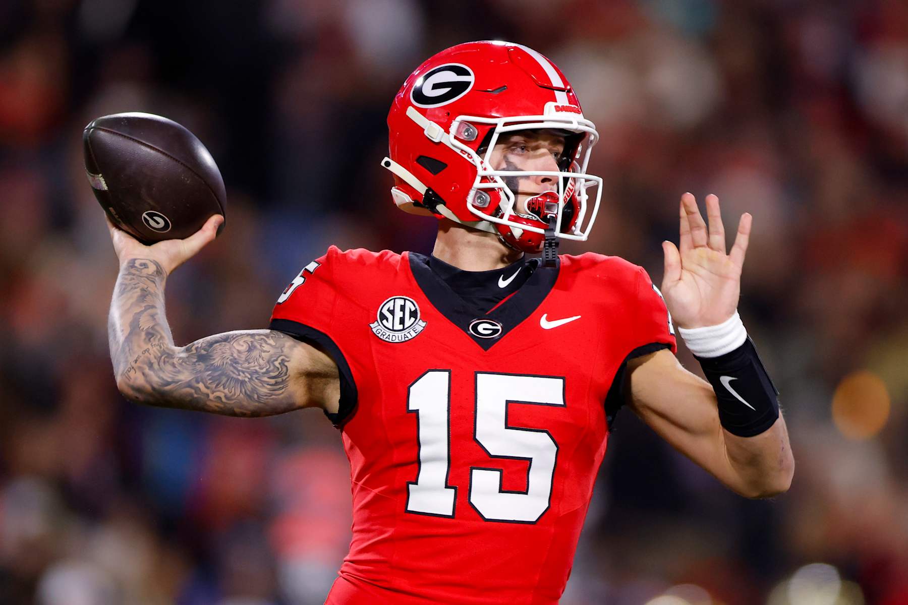 ATHENS, GEORGIA - NOVEMBER 29: Carson Beck #15 of the Georgia Bulldogs passes during the first quarter against the Georgia Tech Yellow Jackets at Sanford Stadium on November 29, 2024 in Athens, Georgia. (Photo by Todd Kirkland/Getty Images)