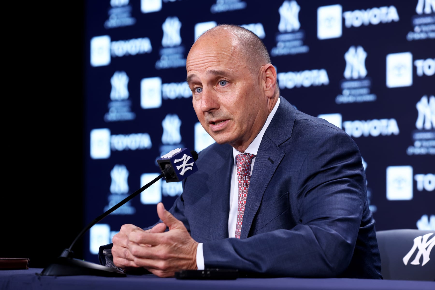 NEW YORK, NEW YORK - APRIL 08: New York Yankees General Manager Brian Cashman speaks to the media prior to the start of the game against the Boston Red Sox at Yankee Stadium on April 08, 2022 in New York City. (Photo by Mike Stobe/Getty Images)