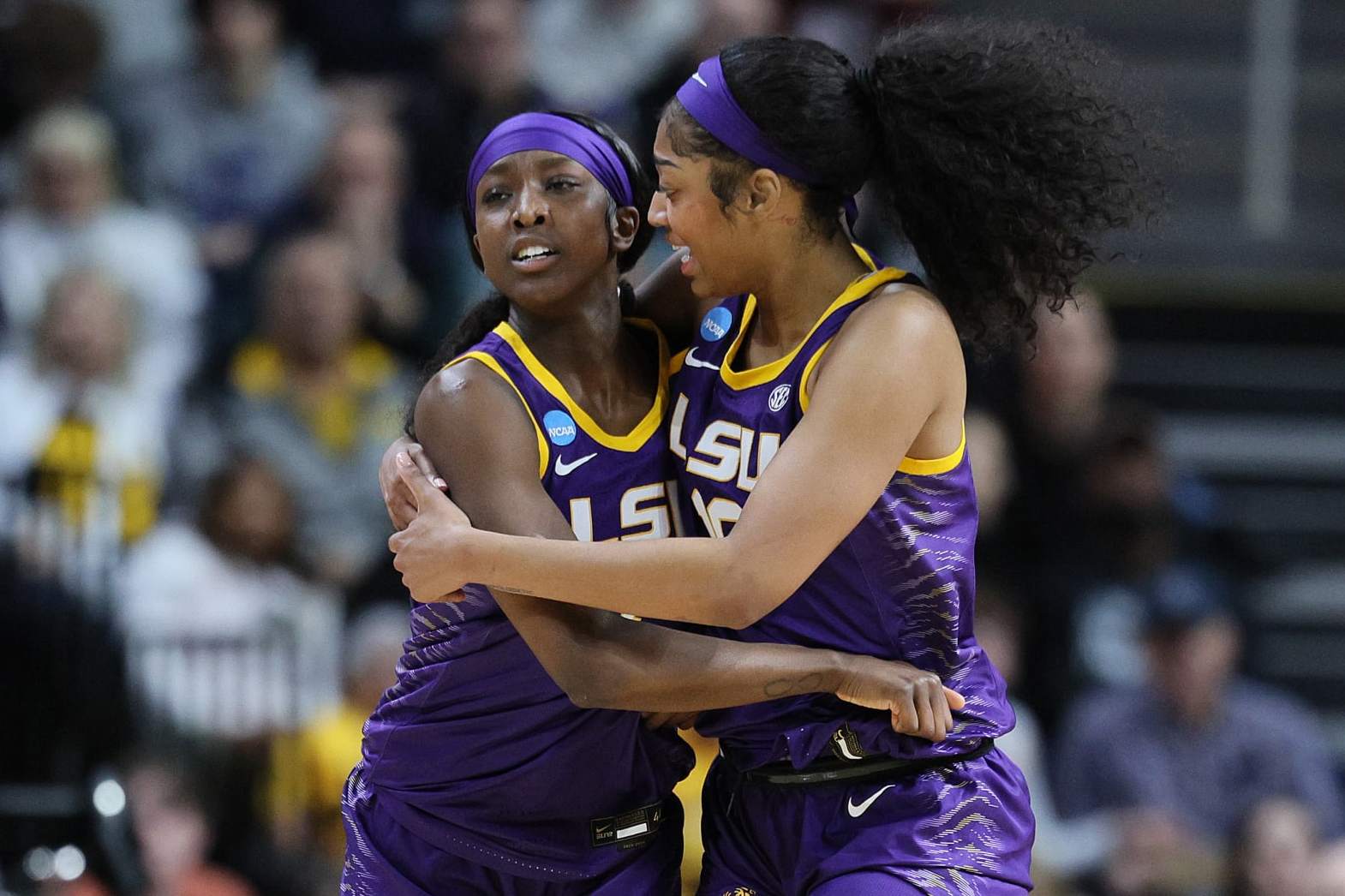 ALBANY, NEW YORK - MARCH 30: Angel Reese #10 of the LSU Tigers and Flau'jae Johnson #4 of the LSU Tigers celebrate in a game against the UCLA Bruins during the second half in the Sweet 16 round of the NCAA Women's Basketball Tournament at MVP Arena on March 30, 2024 in Albany, New York. (Photo by Andy Lyons/Getty Images)