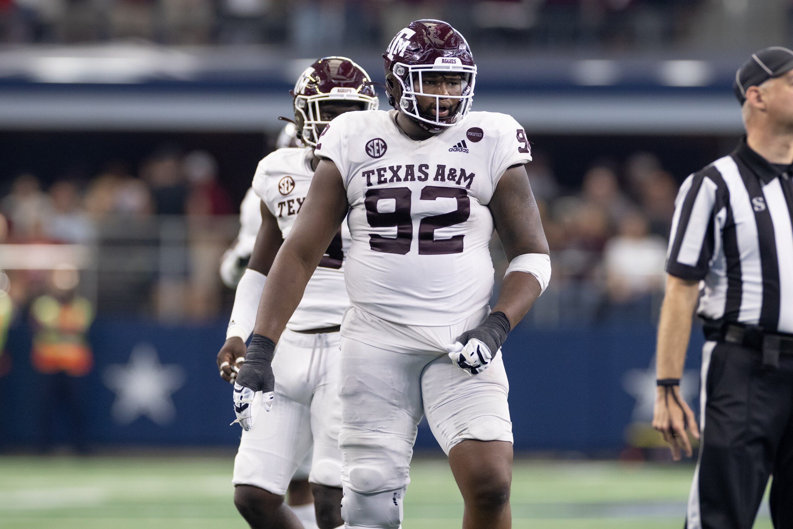 ARLINGTON, TX - SEPTEMBER 25: Texas A&M Aggies defensive lineman Jayden Peevy (#92) looks on during the  Southwest Classic college football game between the Texas A&M Aggies and Arkansas Razorbacks on September 25, 2021 at AT&T Stadium in Arlington, TX.  (Photo by Matthew Visinsky/Icon Sportswire via Getty Images)