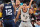 MEMPHIS, TN - FEBRUARY 28: Dejounte Murray #5 of the San Antonio Spurs plays defense on Ja Morant #12 of the Memphis Grizzlies during the game on February 28, 2022 at FedExForum in Memphis, Tennessee. NOTE TO USER: User expressly acknowledges and agrees that, by downloading and or using this photograph, User is consenting to the terms and conditions of the Getty Images License Agreement. Mandatory Copyright Notice: Copyright 2022 NBAE (Photo by Joe Murphy/NBAE via Getty Images)