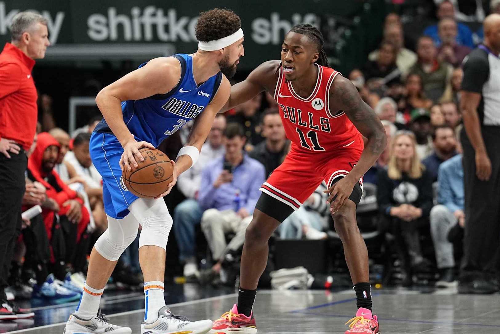 DALLAS, TX - NOVEMBER 6: Ayo Dosunmu #11 of the Chicago Bulls defends drives to the basket during the game against the Dallas Mavericks on November 6, 2024 at American Airlines Center in Dallas, Texas. NOTE TO USER: User expressly acknowledges and agrees that, by downloading and or using this photograph, User is consenting to the terms and conditions of the Getty Images License Agreement. Mandatory Copyright Notice: Copyright 2024 NBAE (Photo by Glenn James/NBAE via Getty Images)