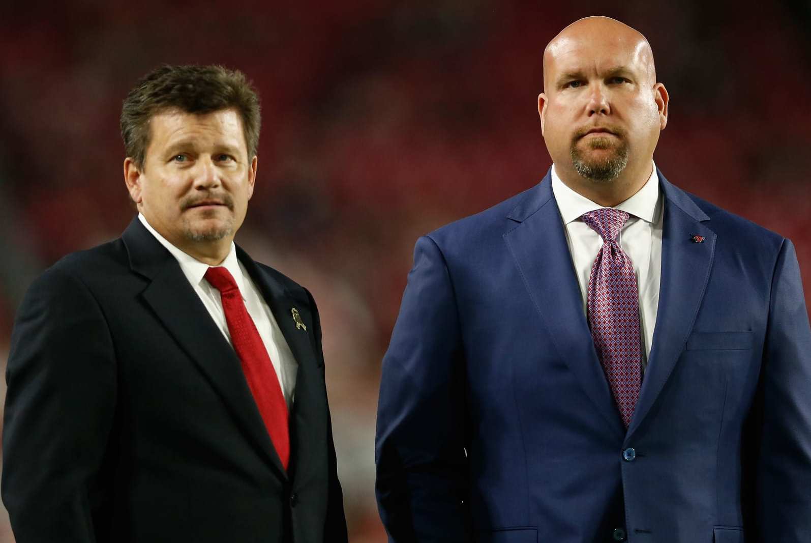 GLENDALE, AZ - NOVEMBER 22: President Michael J. Bidwill of the Arizona Cardinals (L) and general manager Steve Keim (R) watch warm ups before the NFL game against the Cincinnati Bengals at the University of Phoenix Stadium on November 22, 2015 in Glendale, Arizona.  (Photo by Christian Petersen/Getty Images)