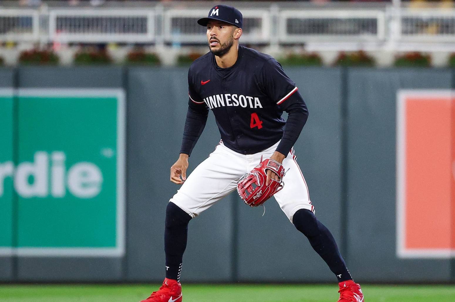 MINNEAPOLIS, MINNESOTA - APRIL 8: Carlos Correa #4 of the Minnesota Twins readies for play against the Los Angeles Dodgers during the eighth inning at Target Field on April 8, 2024 in Minneapolis, Minnesota. (Photo by Matt Krohn/Getty Images)