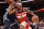 MEMPHIS, TENNESSEE - JANUARY 29: Bradley Beal #3 of the Washington Wizards drives against Jaren Jackson Jr. #13 of the Memphis Grizzlies during the first half  at FedExForum on January 29, 2022 in Memphis, Tennessee. NOTE TO USER: User expressly acknowledges and agrees that, by downloading and or using this photograph, User is consenting to the terms and conditions of the Getty Images License Agreement. (Photo by Justin Ford/Getty Images)