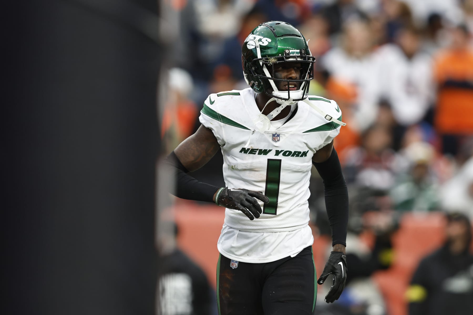 DENVER, COLORADO - OCTOBER 23: Sauce Gardner #1 of the New York Jets reacts after making a pass block in the end zone against Courtland Sutton #14 of the Denver Broncos during an NFL football game between the Denver Broncos and the New York Jets at Empower Field At Mile High on October 23, 2022 in Denver, Colorado. (Photo by Michael Owens/Getty Images)