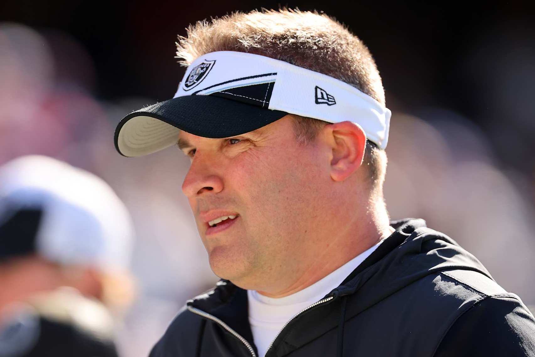 CHICAGO, ILLINOIS - OCTOBER 22: Las Vegas Raiders head coach Josh McDaniels walks the field before the game against the Chicago Bears at Soldier Field on October 22, 2023 in Chicago, Illinois. (Photo by Michael Reaves/Getty Images)