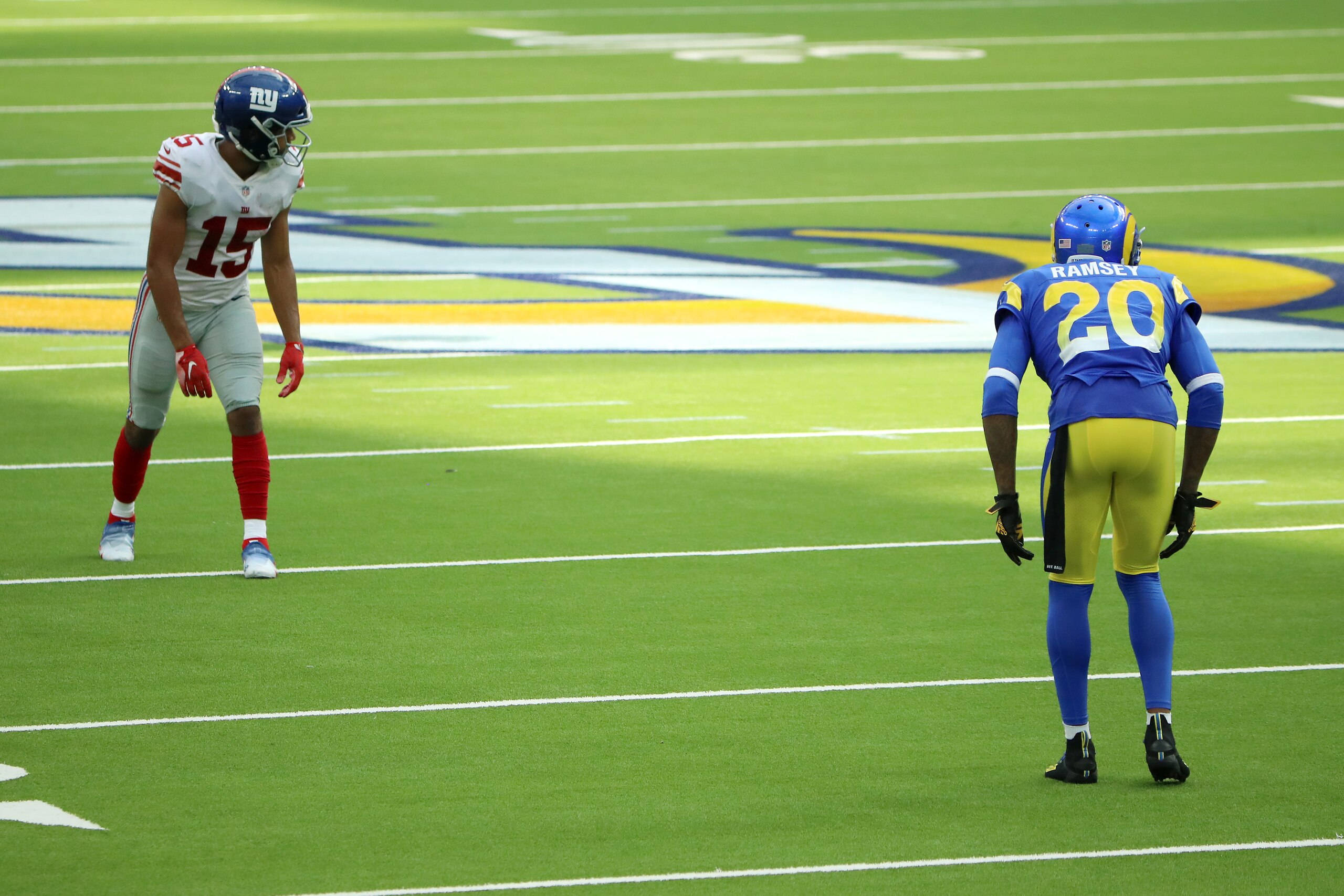 INGLEWOOD, CALIFORNIA - OCTOBER 04: Jalen Ramsey #20 of the Los Angeles Rams and Golden Tate #15 of the New York Giants wait for the play to start during the second half at SoFi Stadium on October 04, 2020 in Inglewood, California. (Photo by Katelyn Mulcahy/Getty Images) INGLEWOOD, CALIFORNIA - OCTOBER 04: Jalen Ramsey #20 of the Los Angeles Rams and Golden Tate #15 of the New York Giants wait for the play to start during the second half at SoFi Stadium on October 04, 2020 in Inglewood, California. (Photo by Katelyn Mulcahy/Getty Images)