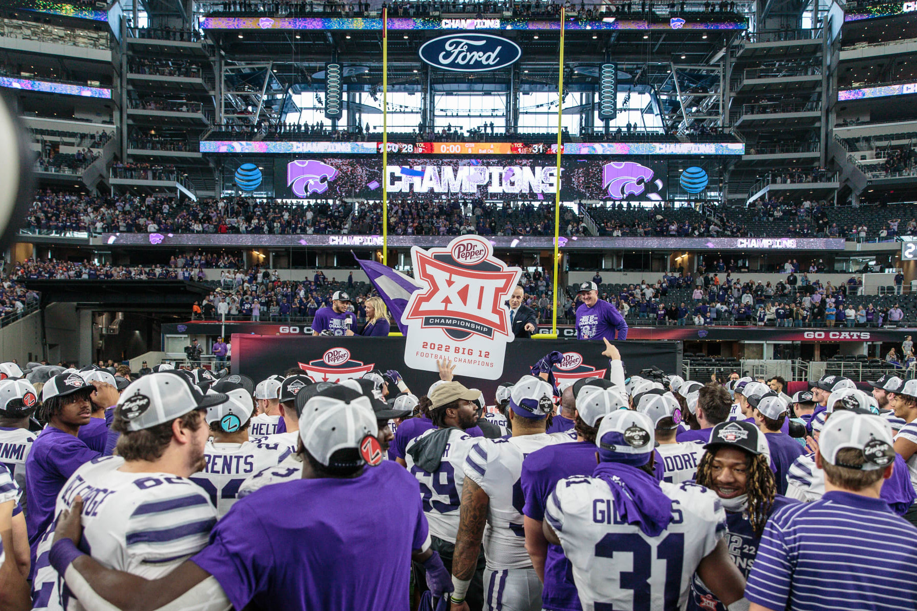 ARLINGTON, TX - DECEMBER 03: Kansas State Wildcats waits for the trophy after winning in overtime against the TCU Horned Frogs on December 3rd, 2022 at ATT Stadium in Arlington, Texas. (Photo by William Purnell/Icon Sportswire via Getty Images)