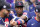 American League's Tim Anderson, of the Chicago White Sox, sits in the dugout prior to the MLB All-Star baseball game, Tuesday, July 13, 2021, in Denver. (AP Photo/Jack Dempsey)