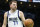 Dallas Mavericks guard Luka Doncic stands on the court during the first half of an NBA basketball game against the Charlotte Hornets in Charlotte, N.C., Sunday, March 26, 2023. (AP Photo/Nell Redmond)