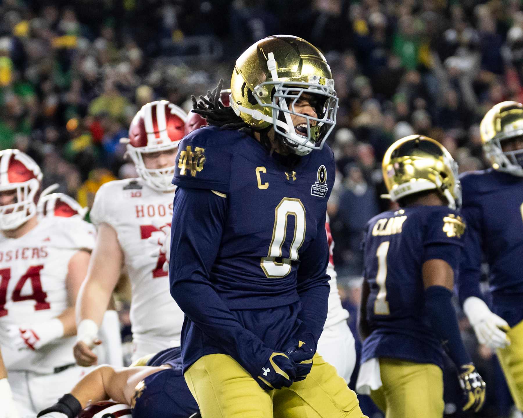 Football SOUTH BEND, INDIANA - DECEMBER 20: Xavier Watts #0 of the Notre Dame Fighting Irish celebrates a stop during a game between the Indiana Hoosiers and the Notre Dame Fighting Irish at Notre Dame Stadium on December 20, 2024 in South Bend, Indiana. (Photo by Steve Limentani/ISI Photos/Getty Images)