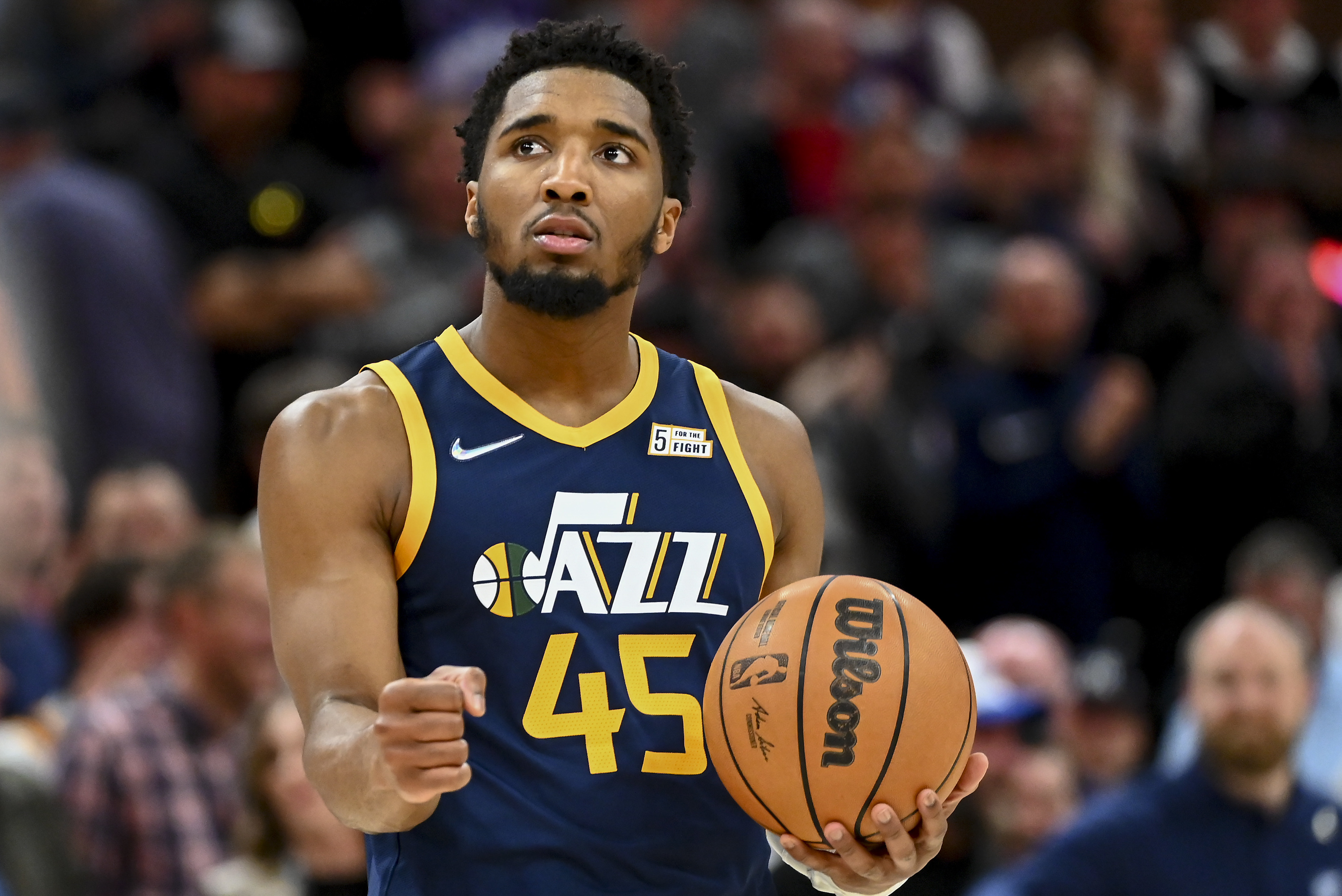 SALT LAKE CITY, UTAH - APRIL 05: Donovan Mitchell #45 of the Utah Jazz celebrates a win in overtime during a game against the Memphis Grizzlies at Vivint Smart Home Arena on April 05, 2022 in Salt Lake City, Utah. NOTE TO USER: User expressly acknowledges and agrees that, by downloading and or using this photograph, User is consenting to the terms and conditions of the Getty Images License Agreement. (Photo by Alex Goodlett/Getty Images)