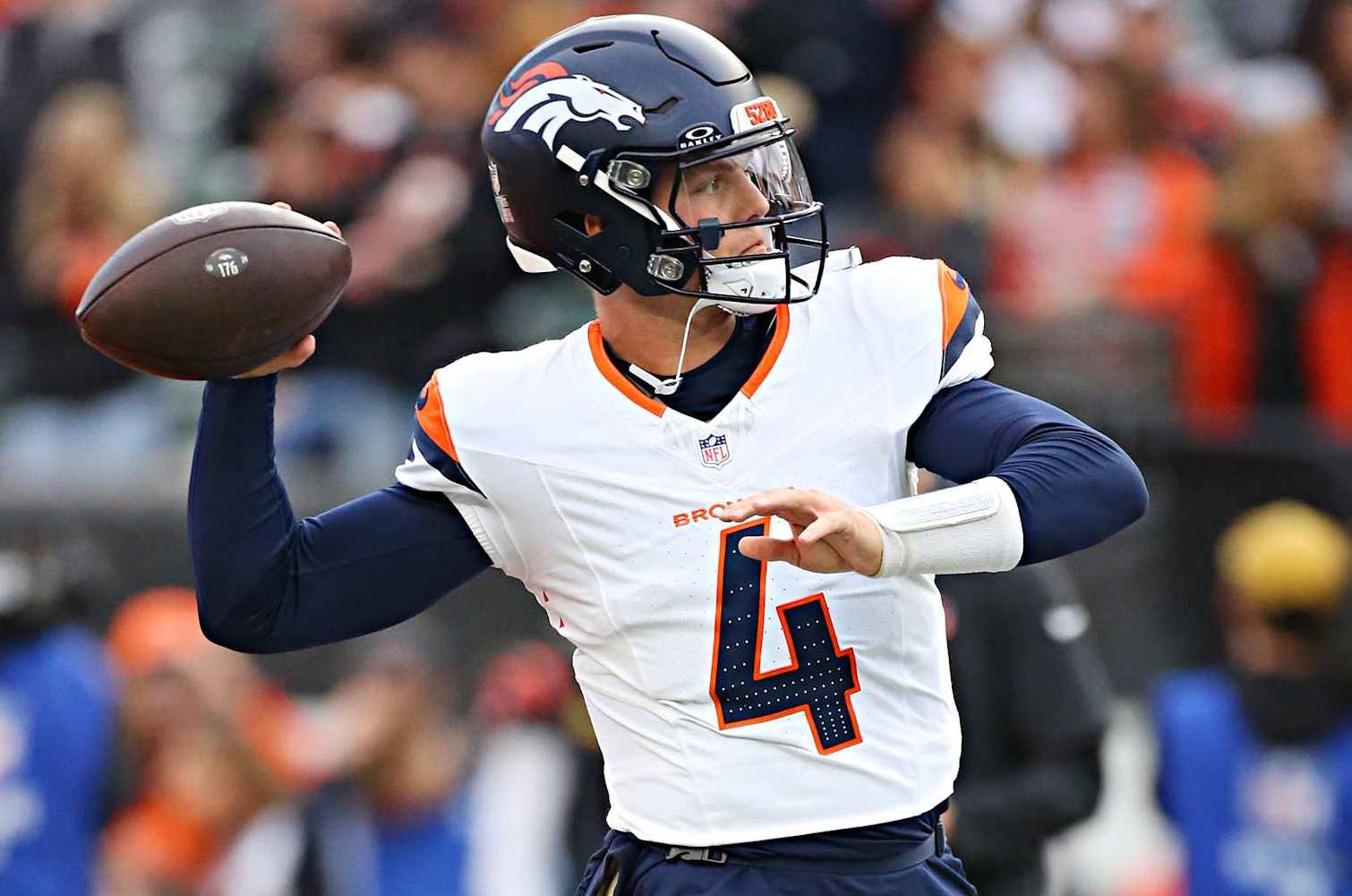 CINCINNATI, OH - DECEMBER 28 - Denver Broncos quarterback Zach Wilson (4) warms up before a game between the Denver Broncos and the Cincinnati Bengals at Paycor Stadium on Saturday, December 28, 2024. (Photo by Jeff Moreland/Icon Sportswire via Getty Images)