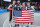SANTIAGO, CHILE - OCTOBER 23: Canyon Barry, Dylan Travis, Jimmer Fredette and Kareem Maddox of Team USA after winning the Gold Medal Game of  Men's Basketball 3x3 at Estadio Espanol on Day 3 of Santiago 2023 Pan Am Games on October 23, 2023 in Santiago, Chile. (Photo by Andy Lyons/Getty Images)