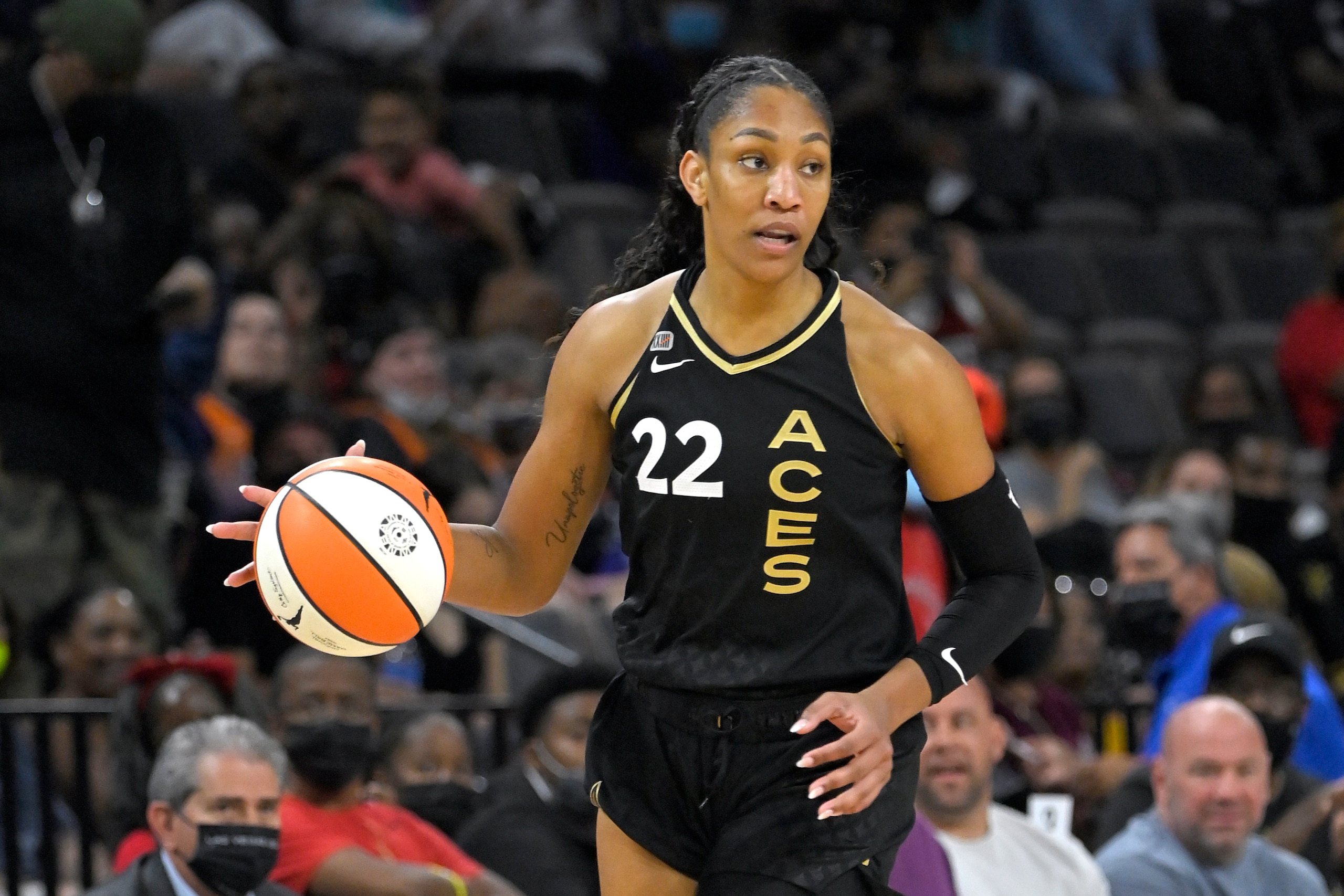Las Vegas Aces forward A'ja Wilson (22) brings the ball up court against the Phoenix Mercury during the first half of Game 2 in the semifinals of the WNBA playoffs Thursday, Sept. 30, 2021, in Las Vegas. (AP Photo/David Becker)
