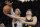San Antonio Spurs' Victor Wembanyama (1) blocks a shot against the Phoenix Suns' Grayson Allen (8) during an NBA basketball game in Phoenix, Tuesday, Oct. 31, 2023. (AP Photo/Darryl Webb)