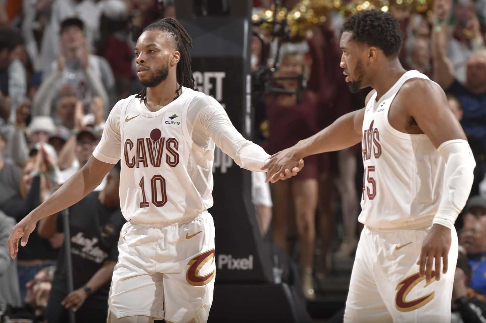 CLEVELAND, OH - MAY 11: Darius Garland #10 high five during the game Donovan Mitchell #45 of the Cleveland Cavaliers during the game against the Boston Celtics during Round 2 Game 3 of the 2024 NBA Playoffs on May 11, 2024 at Rocket Mortgage FieldHouse in Cleveland, Ohio. NOTE TO USER: User expressly acknowledges and agrees that, by downloading and/or using this Photograph, user is consenting to the terms and conditions of the Getty Images License Agreement. Mandatory Copyright Notice: Copyright 2024 NBAE (Photo by David Liam Kyle/NBAE via Getty Images)