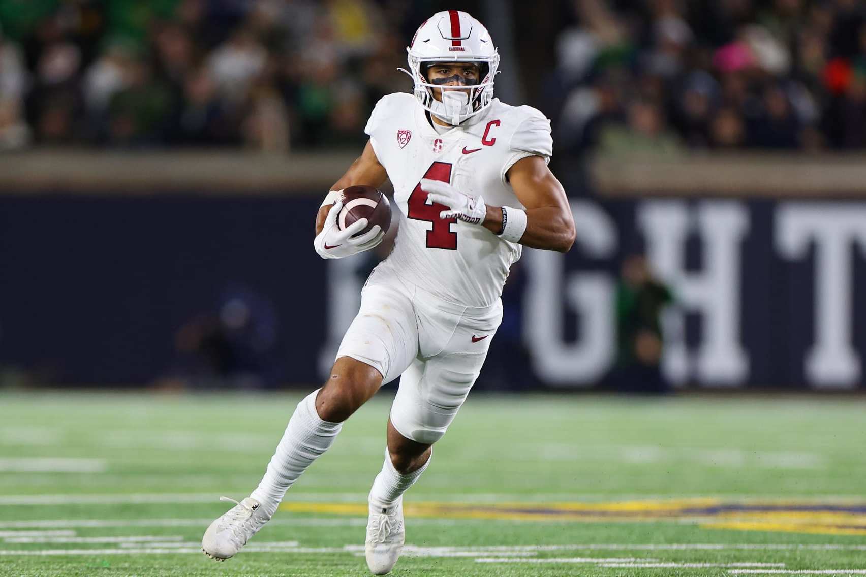 SOUTH BEND, INDIANA - OCTOBER 15: Michael Wilson #4 of the Stanford Cardinal runs with the ball against the Notre Dame Fighting Irish during the second half at Notre Dame Stadium on October 15, 2022 in South Bend, Indiana. (Photo by Michael Reaves/Getty Images)