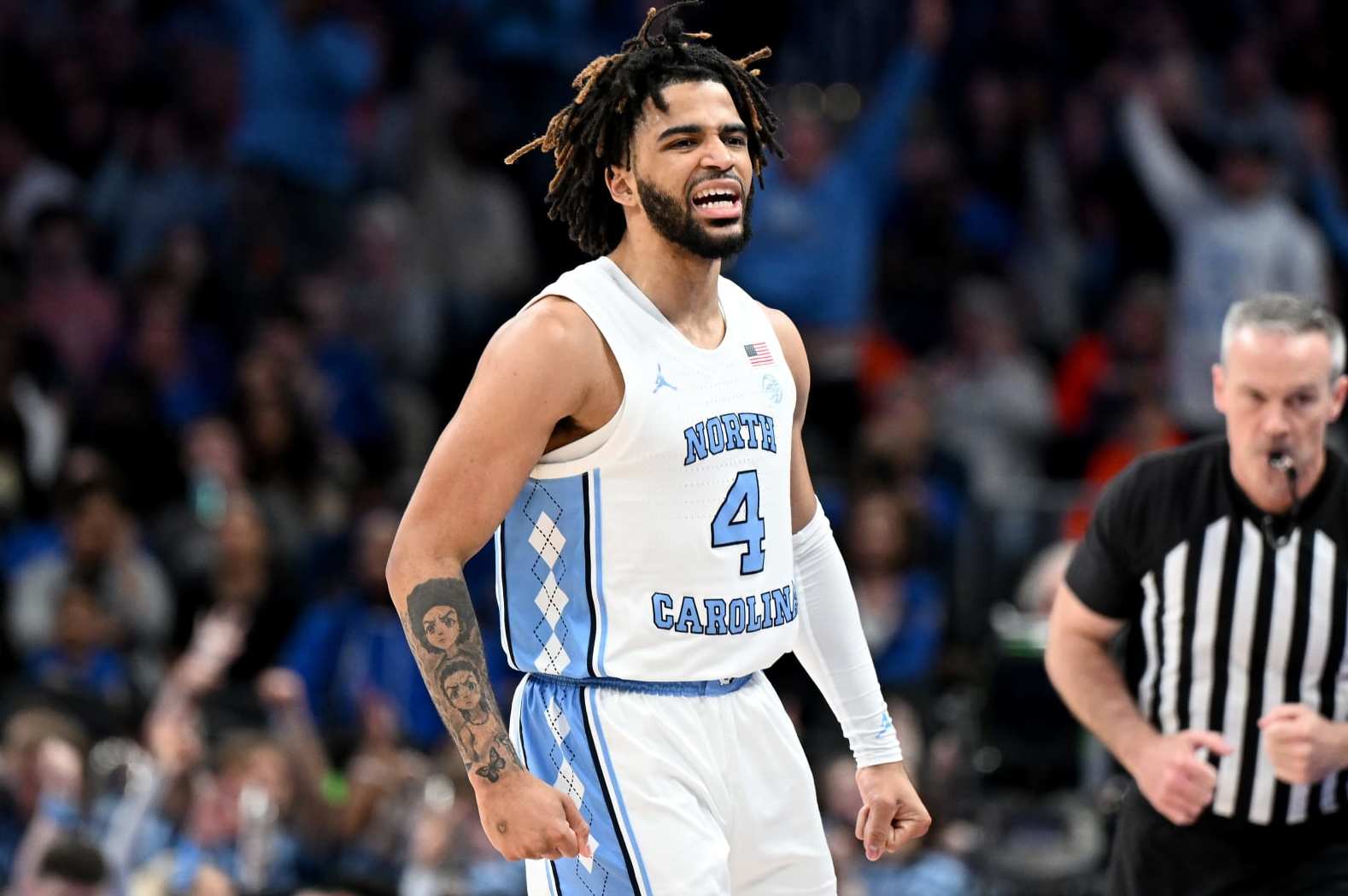 WASHINGTON, DC - MARCH 15: RJ Davis #4 of the North Carolina Tar Heels celebrates in the second half against the Pittsburgh Panthers in the Semifinals of the ACC Men's Basketball Tournament at Capital One Arena on March 15, 2024 in Washington, DC. (Photo by Greg Fiume/Getty Images)