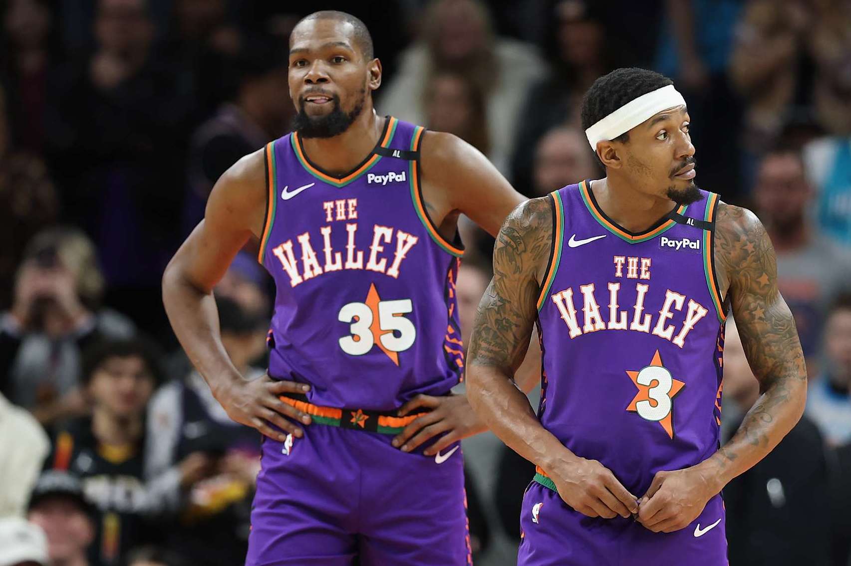 PHOENIX, ARIZONA - JANUARY 12: Kevin Durant #35 and Bradley Beal #3 of the Phoenix Suns during the second half of the NBA game at Footprint Center on January 12, 2025 in Phoenix, Arizona. The Suns defeated the Hornets 120-113. NOTE TO USER: User expressly acknowledges and agrees that, by downloading and or using this photograph, User is consenting to the terms and conditions of the Getty Images License Agreement.  (Photo by Christian Petersen/Getty Images)