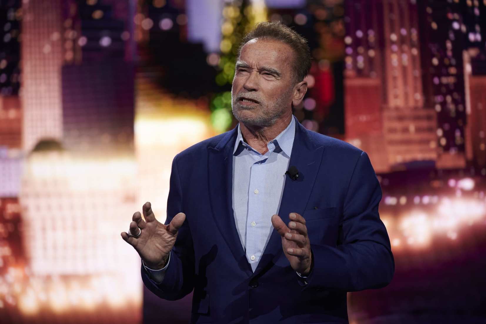 Actor Arnold Schwarzenegger speaks during a press event at the 2023 CES event in Las Vegas, Nevada, US, on Wednesday, Jan. 4, 2023. For the first time, CES has a theme: how technology is addressing the world's biggest challenges. Photographer: Bridget Bennett/Bloomberg via Getty Images