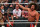SAN JUAN, PUERTO RICO - MAY 06: Bad Bunny celebrates his victory on the ring with LWO, Savio Vega (L) and Carlito Caribbean Cool (R) during the WWE Backlash at Coliseo de Puerto Rico José Miguel Agrelot on May 06, 2023 in San Juan, Puerto Rico.(Photo by Gladys Vega/ Getty Images)