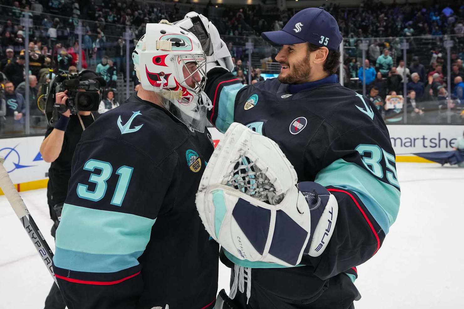 Philipp Grubauer and Joey Daccord.