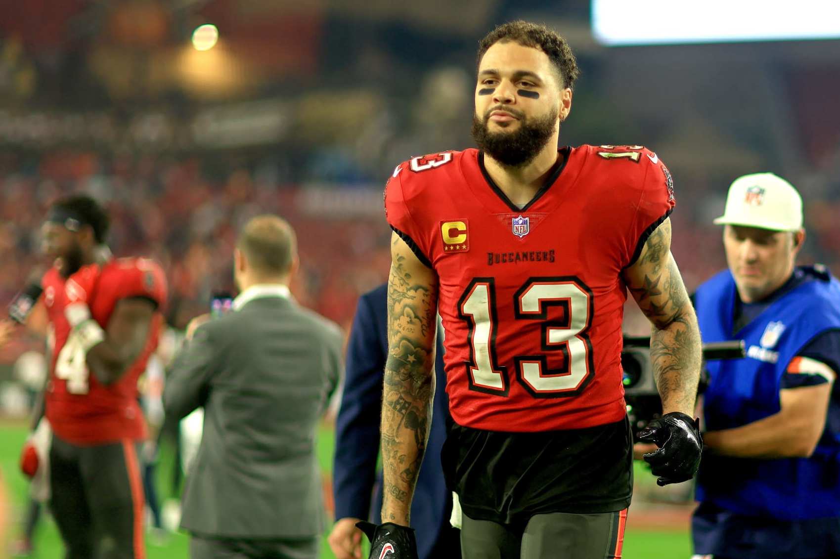 TAMPA, FLORIDA - JANUARY 15: Mike Evans #13 of the Tampa Bay Buccaneers looks on during the NFC Wild Card game against the Philadelphia Eagles at Raymond James Stadium on January 15, 2024 in Tampa, Florida. (Photo by Mike Ehrmann/Getty Images)