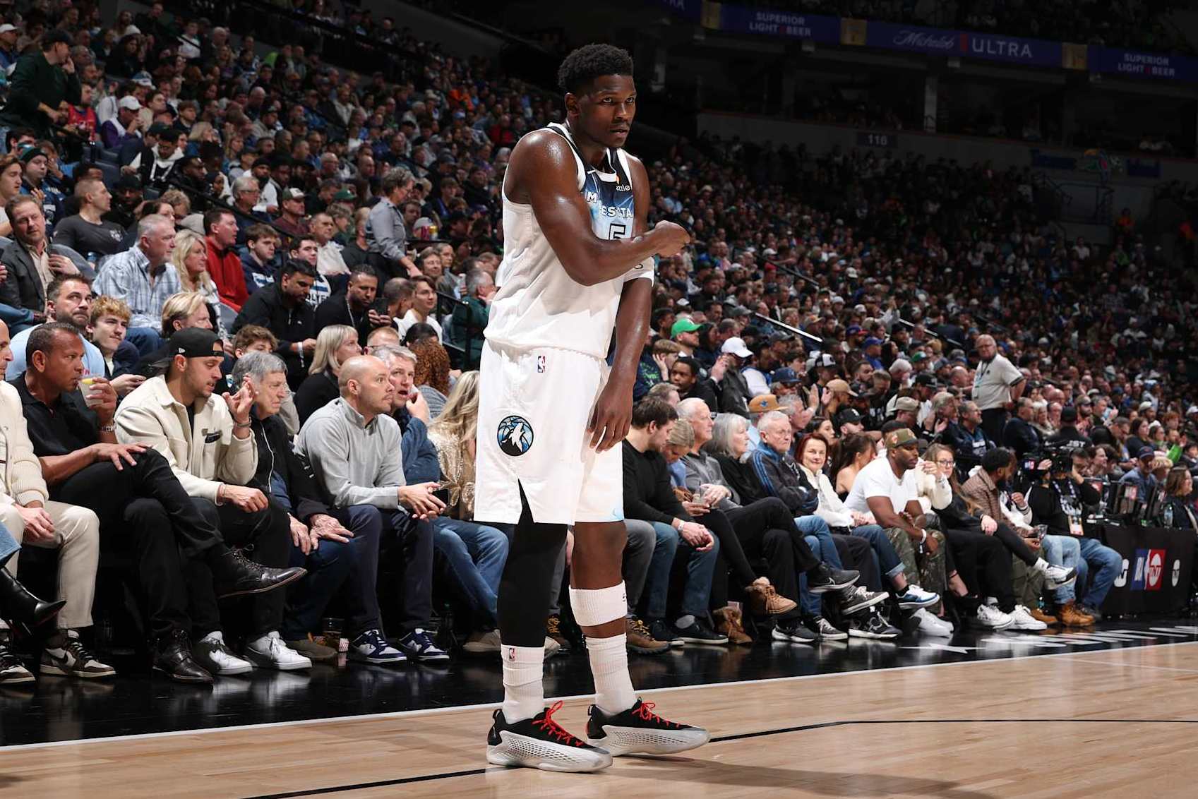 MINNEAPOLIS, MN -  DECEMBER 19: Anthony Edwards #5 of the Minnesota Timberwolves looks on during the game against the New York Knicks on December 19, 2024 at Target Center in Minneapolis, Minnesota. NOTE TO USER: User expressly acknowledges and agrees that, by downloading and or using this Photograph, user is consenting to the terms and conditions of the Getty Images License Agreement. Mandatory Copyright Notice: Copyright 2024 NBAE (Photo by David Sherman/NBAE via Getty Images)