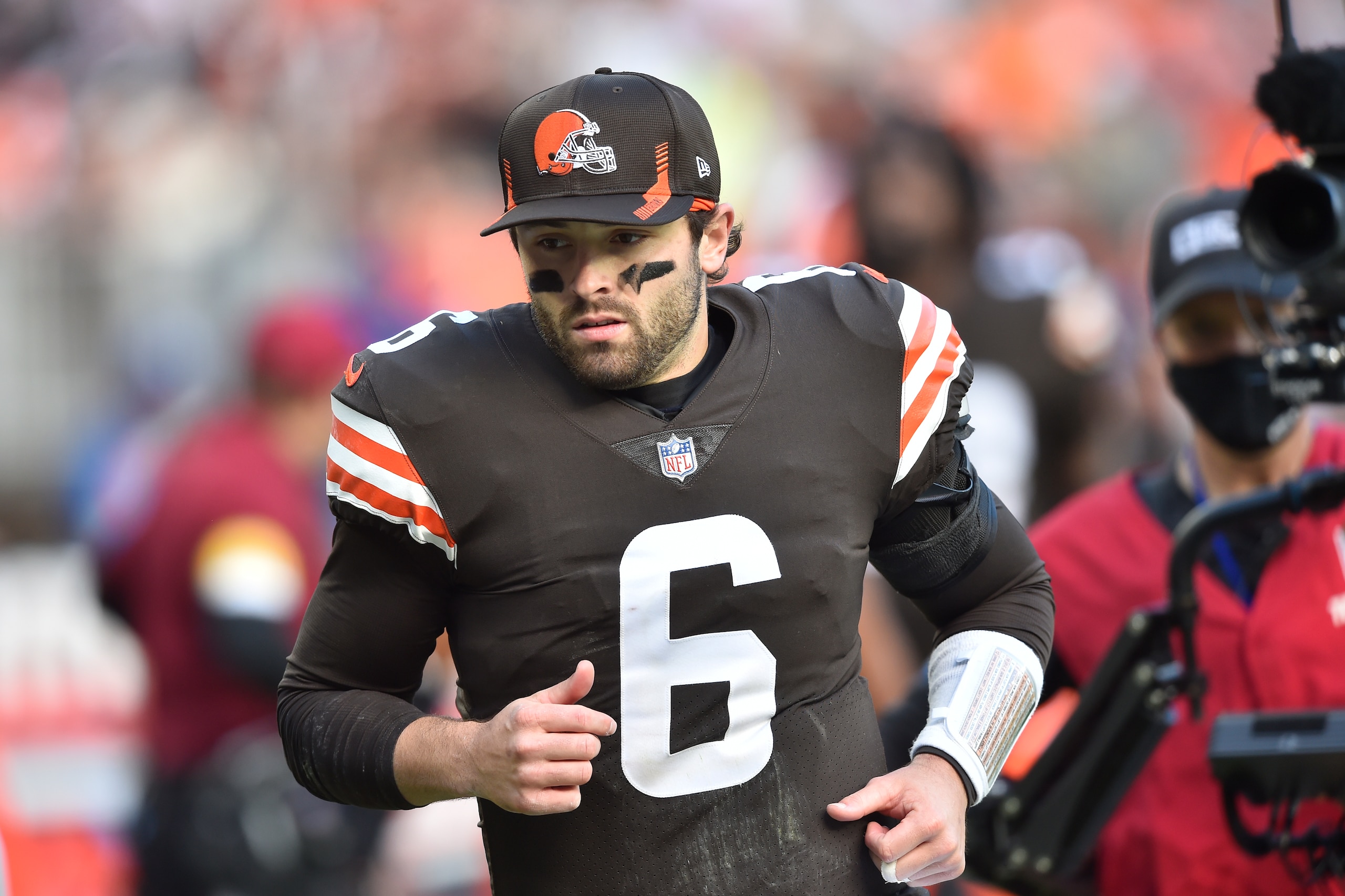 Cleveland Browns quarterback Baker Mayfield runs on the field at halftime during an NFL football game against the Pittsburgh Steelers, Sunday, Oct. 31, 2021, in Cleveland. The Steelers won 15-10. (AP Photo/David Richard)