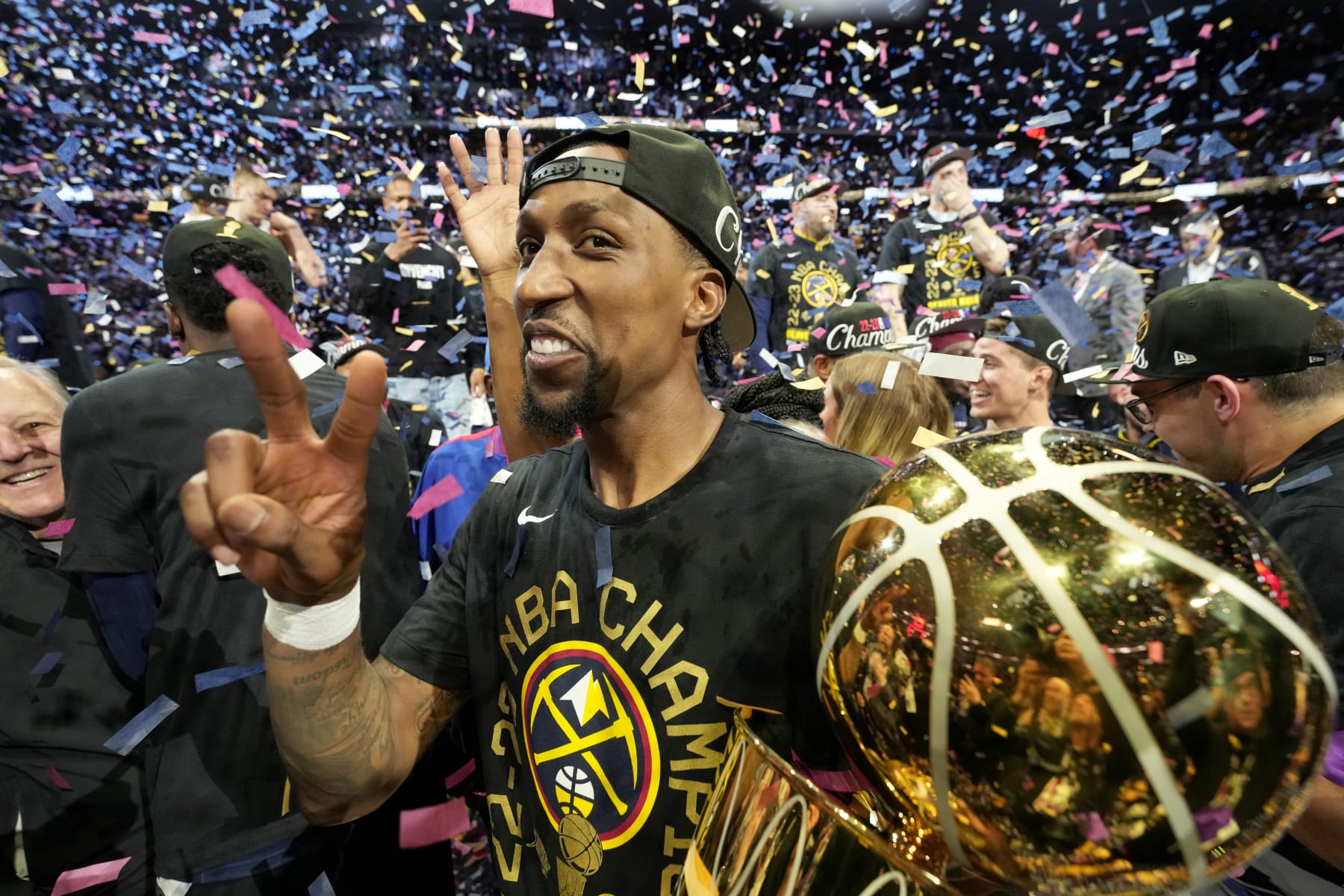 DENVER, CO - JUNE 12: Kentavious Caldwell-Pope #5 of the Denver Nuggets celebrates with the Larry O'Brien trophy after winning Game Five of the 2023 NBA Finals on June 12, 2023 at Ball Arena in Denver, Colorado. NOTE TO USER: User expressly acknowledges and agrees that, by downloading and or using this Photograph, user is consenting to the terms and conditions of the Getty Images License Agreement. Mandatory Copyright Notice: Copyright 2023 NBAE (Photo by Jesse D. Garrabrant/NBAE via Getty Images)