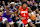 SALT LAKE CITY, UTAH - MARCH 29: Jalen Green #4 of the Houston Rockets drives past Taylor Hendricks #0 of the Utah Jazz during the first half of a game at Delta Center on March 29, 2024 in Salt Lake City, Utah. NOTE TO USER: User expressly acknowledges and agrees that, by downloading and or using this photograph, User is consenting to the terms and conditions of the Getty Images License Agreement.  (Photo by Alex Goodlett/Getty Images)