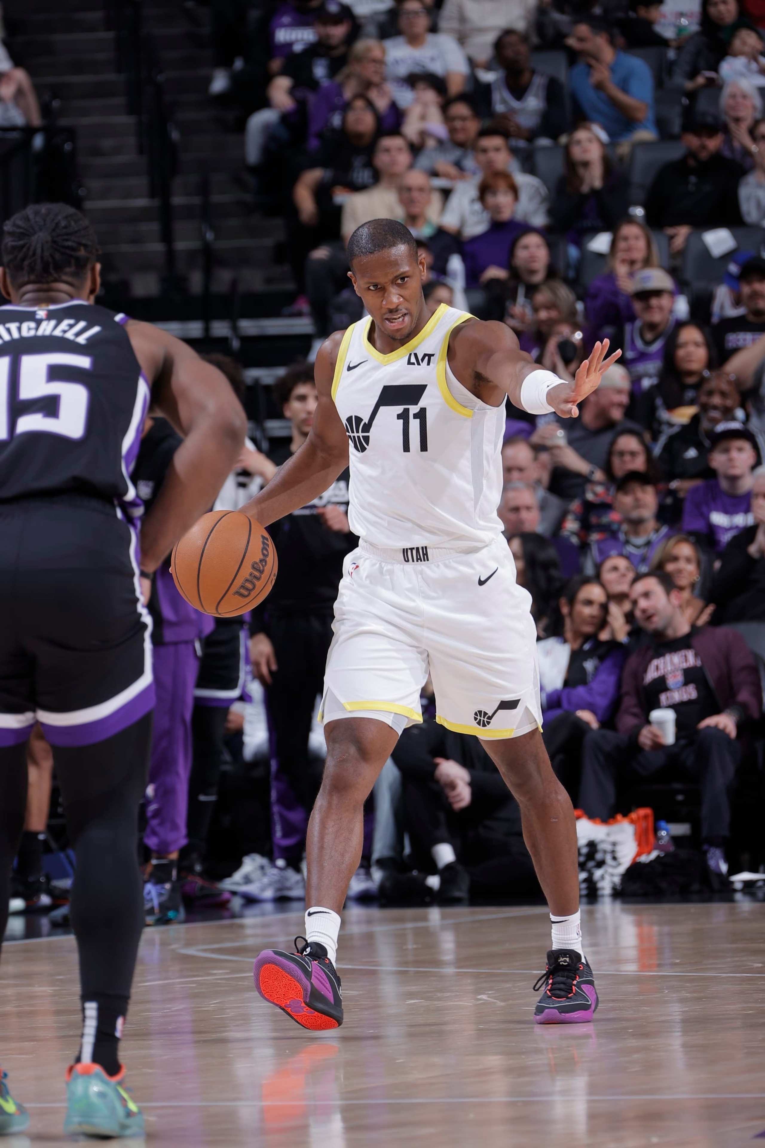 SACRAMENTO, CA - MARCH 31: Kris Dunn #11 of the Utah Jazz dribbles the ball during the game against the Sacramento Kings on March 31, 2024 at Golden 1 Center in Sacramento, California. NOTE TO USER: User expressly acknowledges and agrees that, by downloading and or using this Photograph, user is consenting to the terms and conditions of the Getty Images License Agreement. Mandatory Copyright Notice: Copyright 2024 NBAE (Photo by Rocky Widner/NBAE via Getty Images)