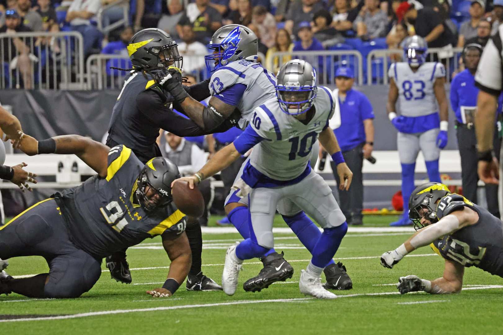 SAN ANTONIO, TX - FEBRUARY 19: A.J. McCarron #10 of the St. Louis Battlehawks scrambles against of the San Antonio Brahamas at the Alamodome on February 19, 2023 in San Antonio, Texas.  (Photo by Ronald Cortes/Getty Images)