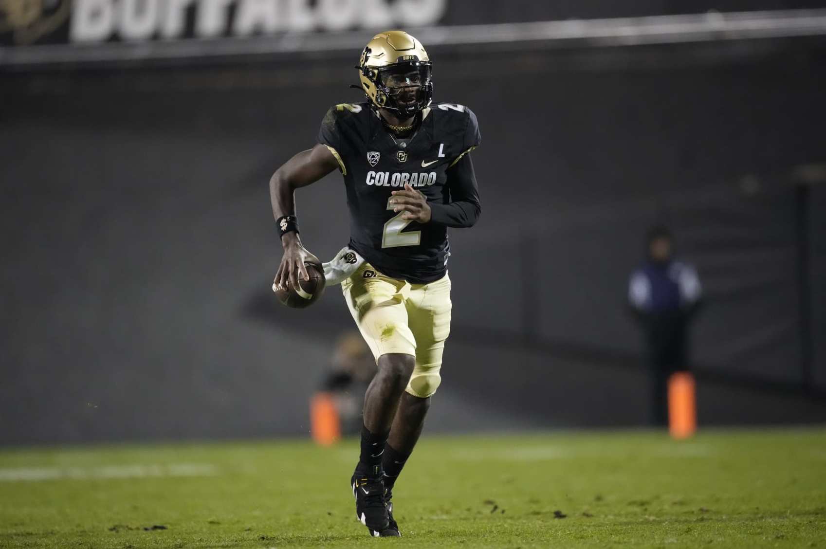 Colorado quarterback Shedeur Sanders (2) in the first half of an NCAA college football game Friday, Oct. 13, 2023, in Boulder, Colo. (AP Photo/David Zalubowski)