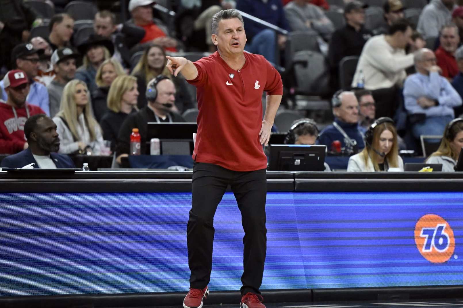 LAS VEGAS, NEVADA - MARCH 14: Head coach Kyle Smith of the Washington State Cougars signals to his team in the second half of a quarterfinal game against the Stanford Cardinal of the Pac-12 Conference basketball tournament at T-Mobile Arena on March 14, 2024 in Las Vegas, Nevada. The Cougars defeated the Cardinal 79-62.  (Photo by David Becker/Getty Images)