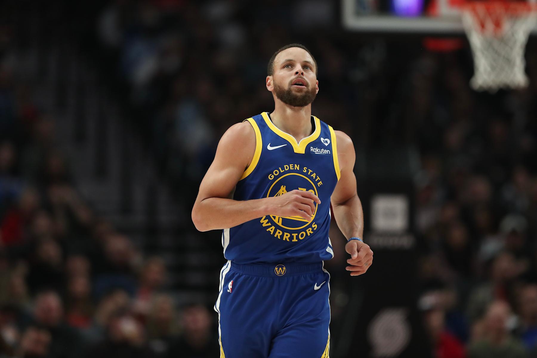 PORTLAND, OREGON - APRIL 11: Stephen Curry #30 of the Golden State Warriors plays during the first quarter against the Portland Trail Blazers at Moda Center on April 11, 2024 in Portland, Oregon. NOTE TO USER: User expressly acknowledges and agrees that, by downloading and or using this photograph, User is consenting to the terms and conditions of the Getty Images License Agreement.  (Photo by Amanda Loman/Getty Images)