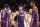 PHOENIX, ARIZONA - DECEMBER 29:  Devin Booker #1 of the Phoenix Suns celebrates with Bradley Beal #3 and Kevin Durant #35 after scoring against the Charlotte Hornetsduring the second half of the NBA game at Footprint Center on December 29, 2023 in Phoenix, Arizona. NOTE TO USER: User expressly acknowledges and agrees that, by downloading and or using this photograph, User is consenting to the terms and conditions of the Getty Images License Agreement.  (Photo by Christian Petersen/Getty Images)