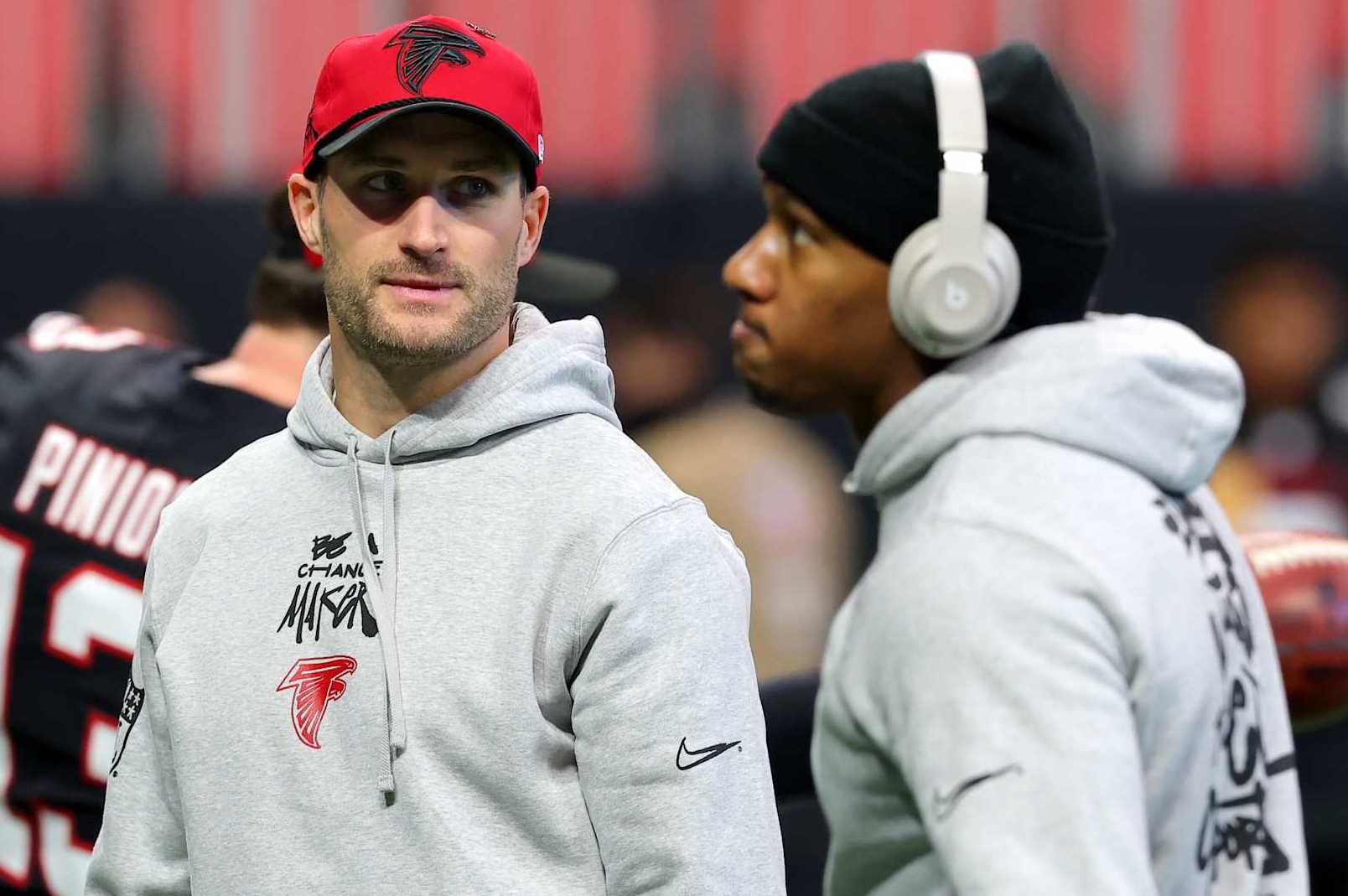 ATLANTA, GEORGIA - DECEMBER 22: Kirk Cousins #18 and Michael Penix Jr. #9 of the Atlanta Falcons look on during warmups before playing the New York Giants at Mercedes-Benz Stadium on December 22, 2024 in Atlanta, Georgia. (Photo by Kevin C. Cox/Getty Images)