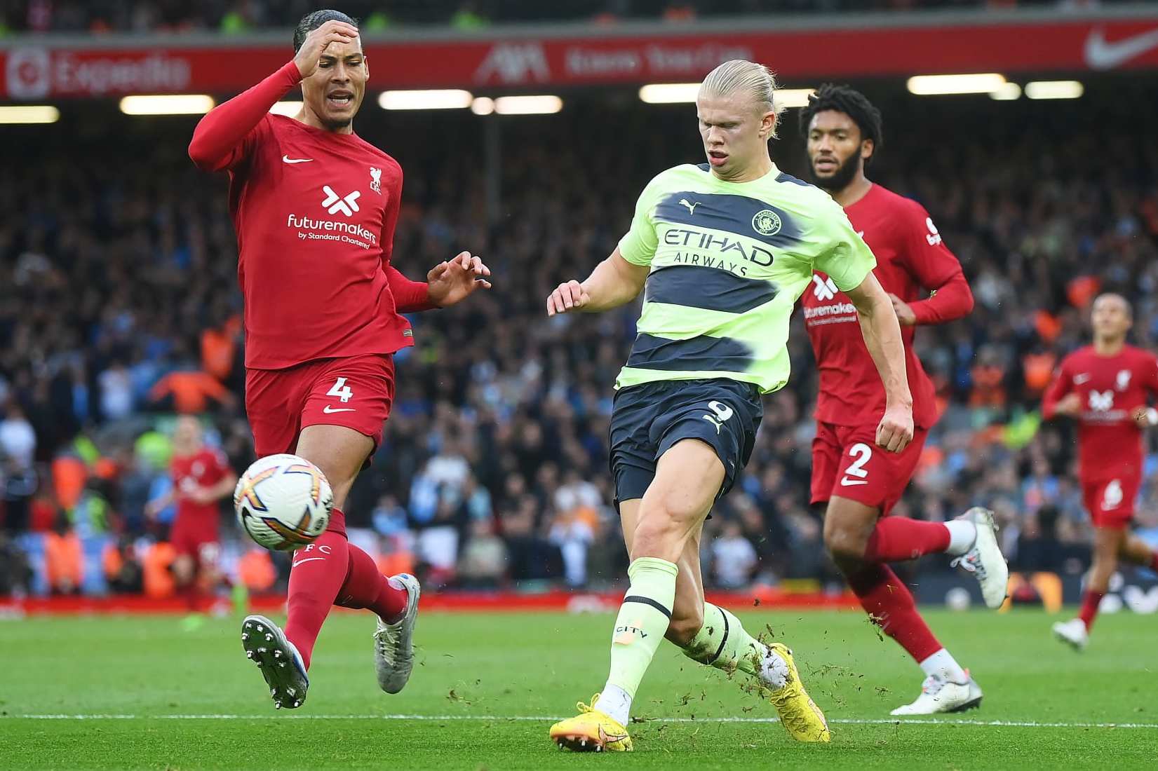 Liverpool's Virgil van Dijk and Manchester City's Erling Haaland.