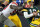 GREEN BAY, WI - JANUARY 15:   Aaron Rodgers #12 of the Green Bay Packers gets sacked by  Jason Pierre-Paul #90 and  Michael Boley #59 of the New York Giants during their NFC Divisional playoff game at Lambeau Field on January 15, 2012 in Green Bay, Wisconsin.  (Photo by Jamie Squire/Getty Images)